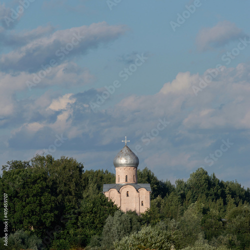 Church of the Savior on Nereditsa, Veliky Novgorod, Novgorod region, Russia. Orthodox church on forest background photo