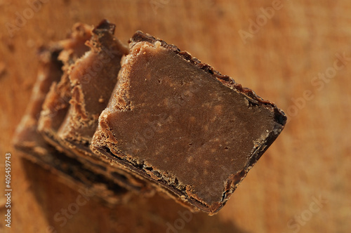 Wallpaper Mural Top view pieces of chocolate candy closeup. Shallow depth of field Torontodigital.ca