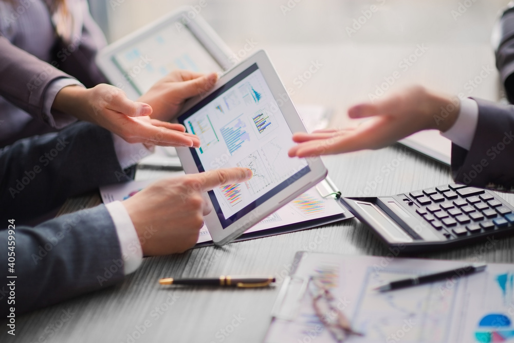 close up. business colleagues discussing financial documents. close up. business colleagues discussing financial documents.