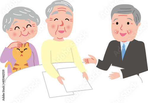 打ち合わせをするシニア夫婦とシニア男性担当者