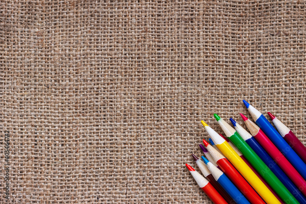 Set of colorful pencils on burlap. Set of colorful pencils on burlap.