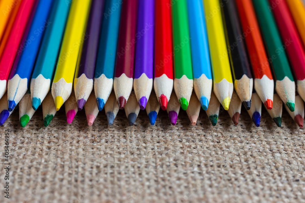 Set of colorful pencils on burlap. Set of colorful pencils on burlap.