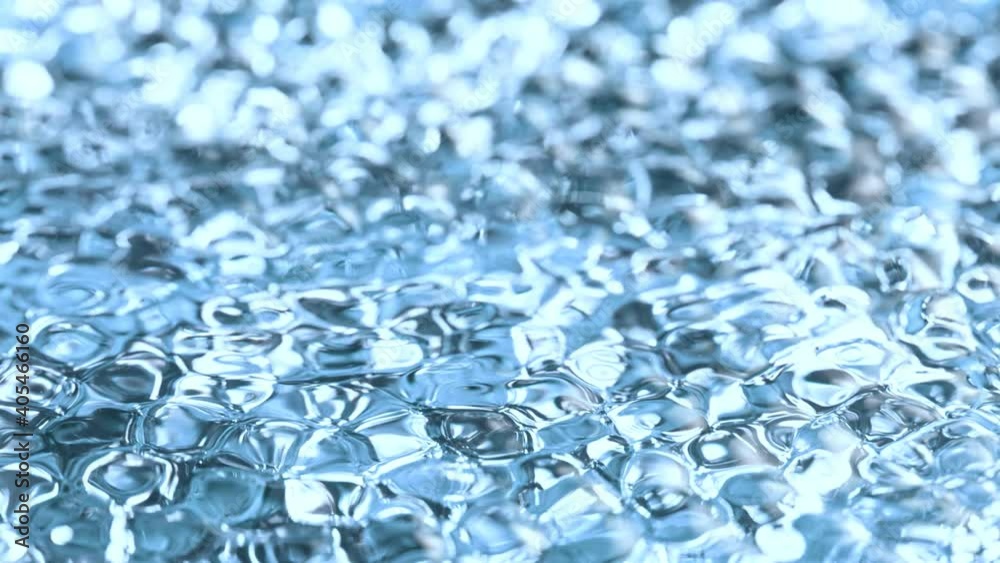 Super Slow Motion Abstract Shot of Waving Blue Clear Liquid Surface at 1000fps. Super Slow Motion Abstract Shot of Waving Blue Clear Liquid Surface at 1000fps.
