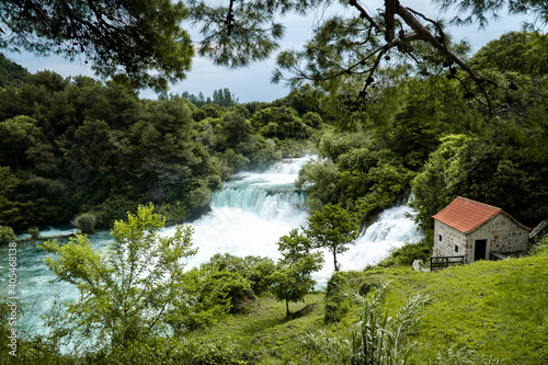 Large waterfall in forest 