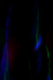 Abstract photo of blurred motion and colorful lights at dark. Abstract high resolution background. Copy space.