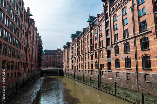 Old warehouses next to a canal in HafenCity, Hamburg, Germany © jordi2r