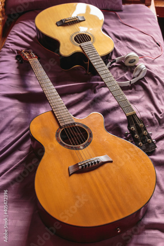 Two classic guitar in bed