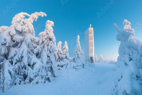 New Lookout tower in the shape of pentagon, Velka Destna, Orlicke mountains, Eastern Bohemia, Czech Republic Beautiful winter landscape with frosty trees in Eagle mountains, it si 150km from Prague.