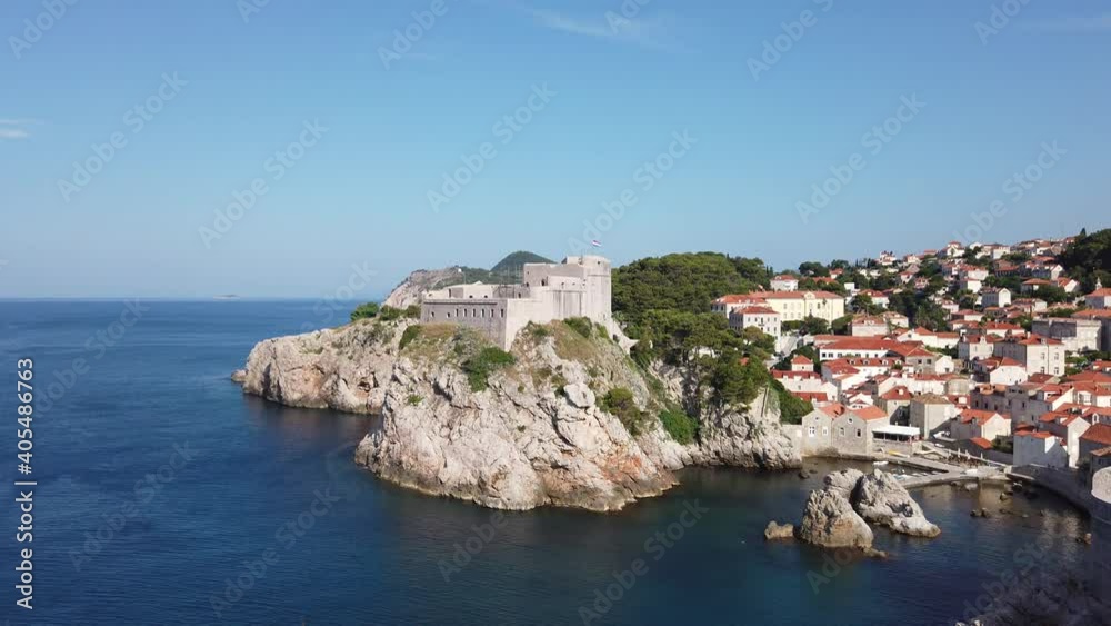 Fort Lovrijenac and surroundings in Dubrovnik, Croatia with blue sky - Pan from left Fort Lovrijenac and surroundings in Dubrovnik, Croatia with blue sky - Pan from left