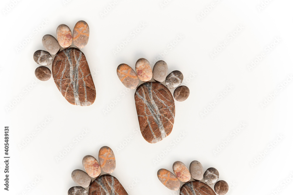 A leg made of sea stones. Marine background. A leg made of sea stones. Marine background.