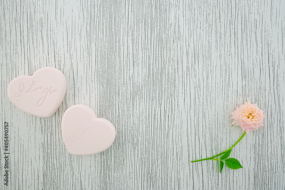 Pink heart on a gray background. Composition for Valentine's Day. Top view, copy space, flat lay. Pink heart on a gray background. Composition for Valentine's Day. Top view, copy space, flat lay.