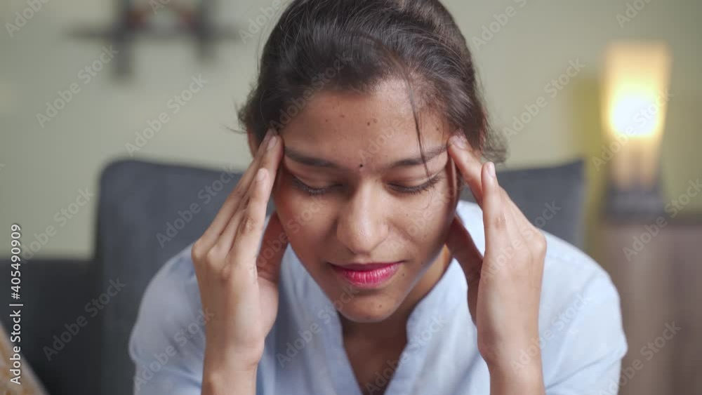 Head shot of young business girl suffering from headache - Concept of stress, work pressure and relationship problems Head shot of young business girl suffering from headache - Concept of stress, work pressure and relationship problems