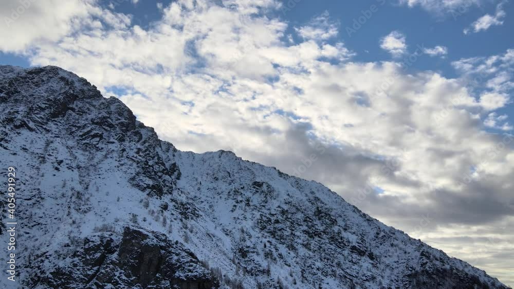 Daylight drone flight in mountain landscape with snow. Alps, Italy. Aerial video footage. Daylight drone flight in mountain landscape with snow. Alps, Italy. Aerial video footage.