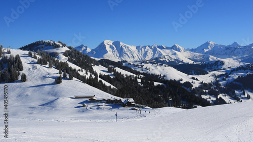 Snow covered mountain ranges seen from Horeflue, Schoenried.