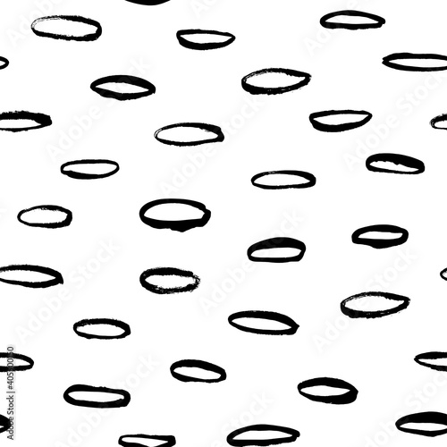 Polka dot grunge seamless vector pattern. Oval brushstrokes and rounded shapes. Hand drawn abstract ink background. Smears, ellipses, outlines splotches. Abstract wallpaper design, textile print