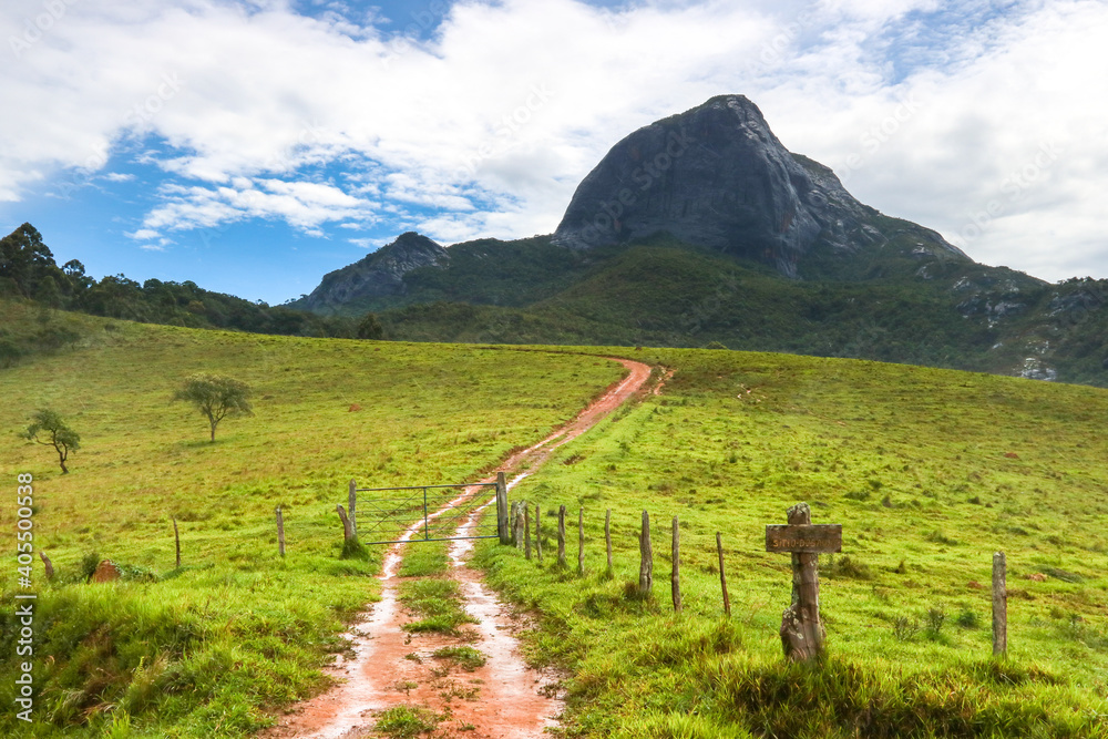 Lonely road with mountain in the countryside, Aiuruoca/MG, Brazil
