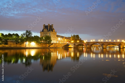 Twilight over the river Seine and Louvre museum in Paris