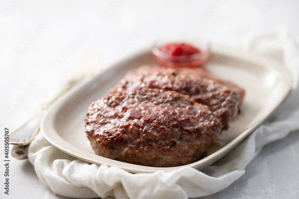 fried ground meat with tomato sauce on dish fried ground meat with tomato sauce on dish