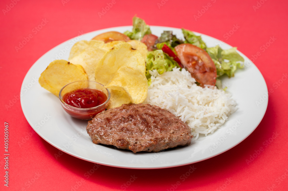 fried ground meat with tomato sauce and boiled rice on dish fried ground meat with tomato sauce and boiled rice on dish