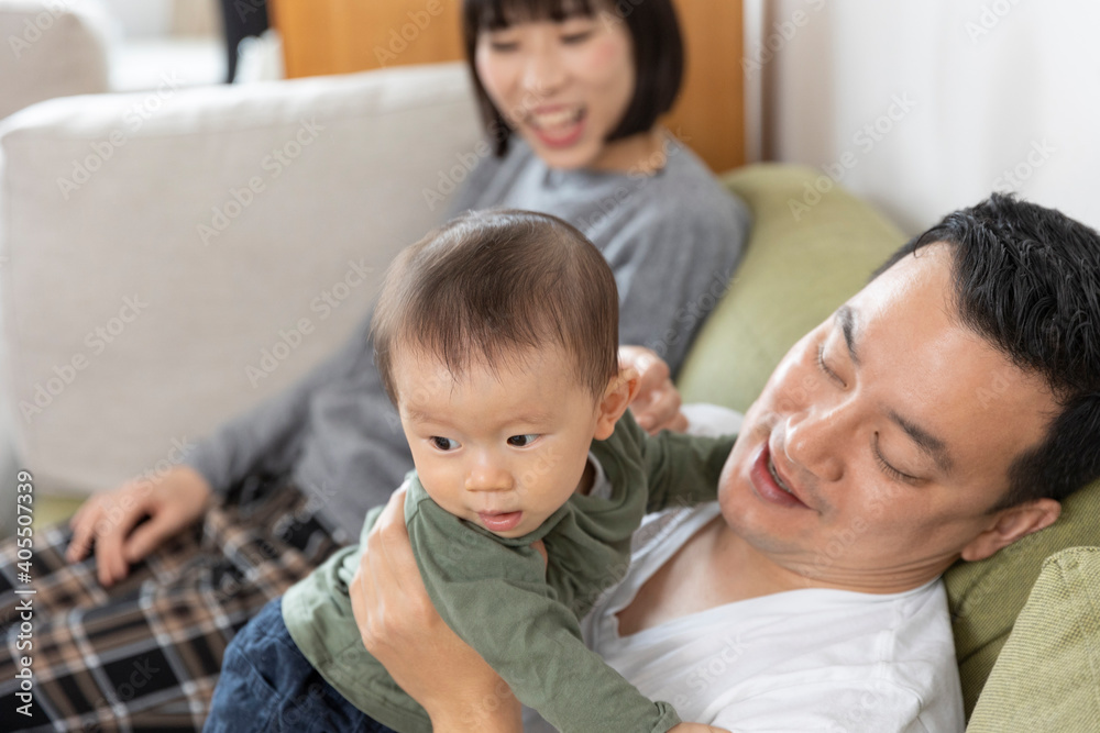 Portrait of a happy asain family in living room Portrait of a happy asain family in living room