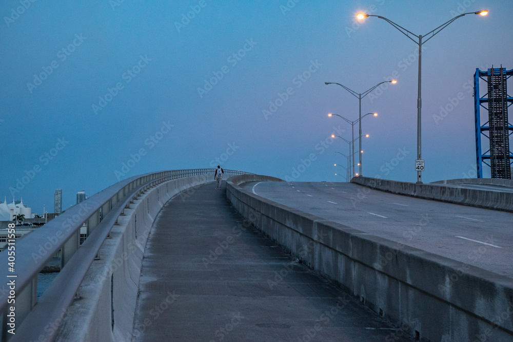 A Man crossing a Bridge in Miami - port blvd - NE 6th Street - USA - EEUU