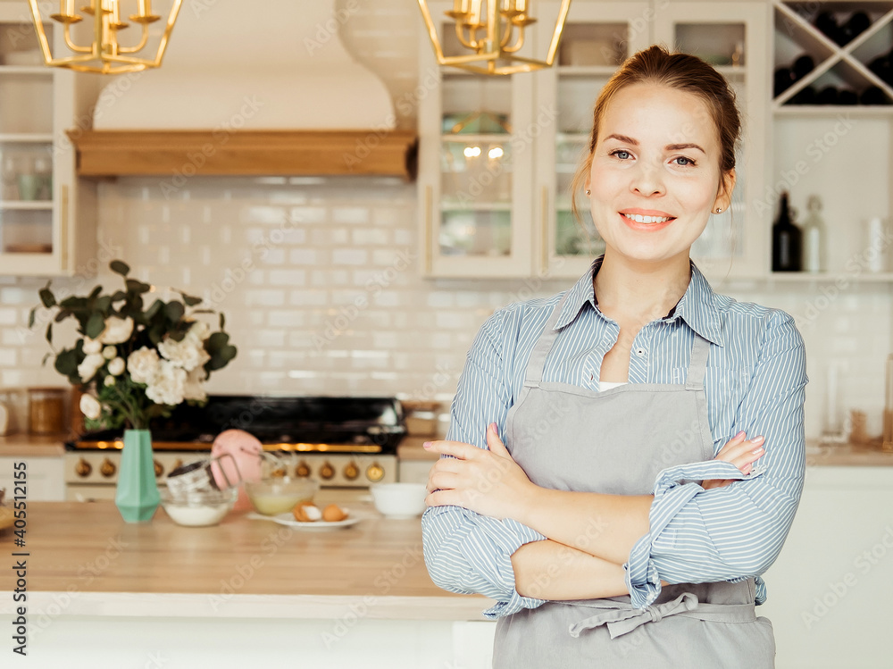 Lifestyle, cooking and freelance concept: Pretty young woman chef on modern kithcen Lifestyle, cooking and freelance concept: Pretty young woman chef on modern kithcen