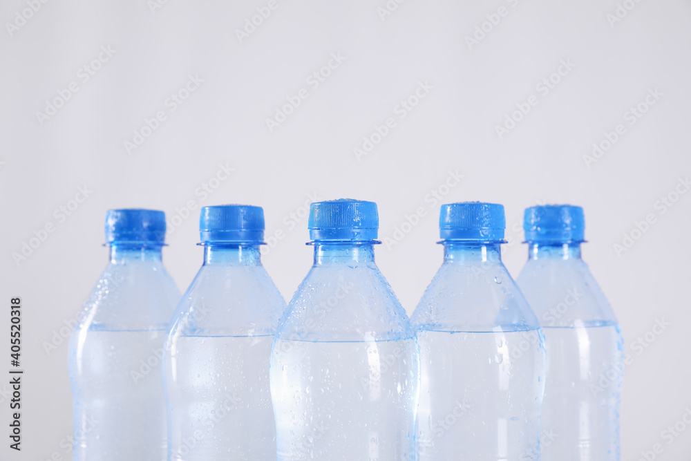 Plastic bottles with pure water on white background Plastic bottles with pure water on white background