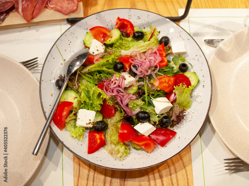 Greek salad appetizer fresh on table Greek salad appetizer fresh on table