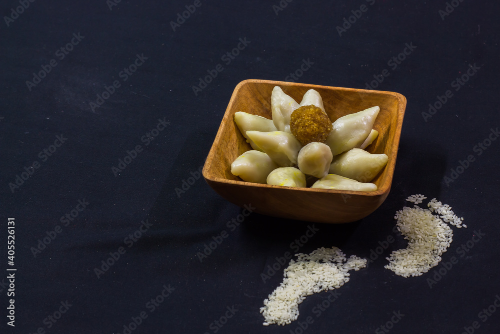 delicious bengali rice flour coconut dumpling served during bengali