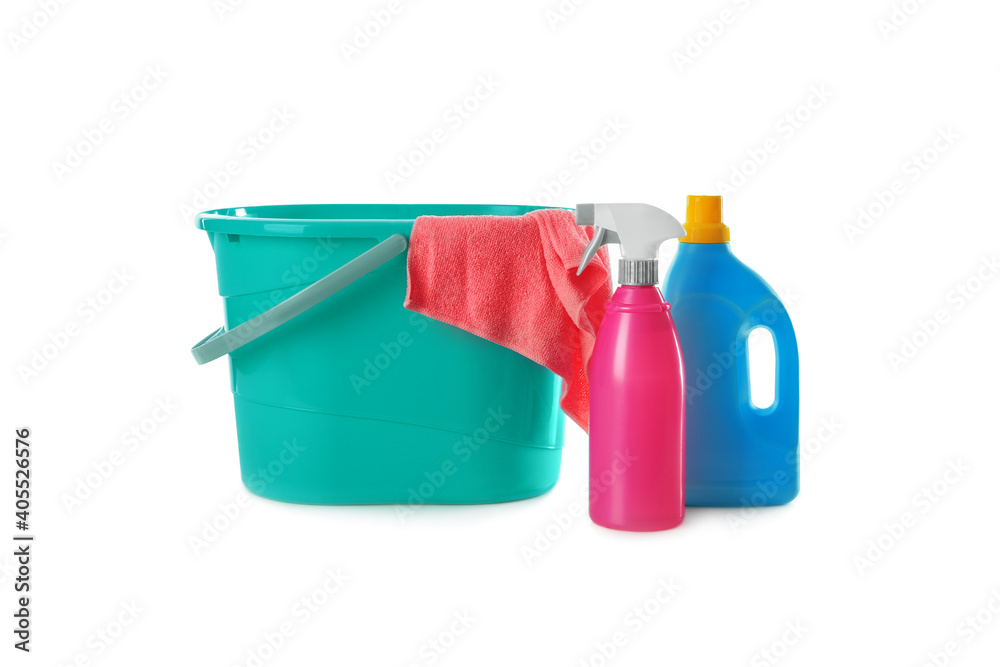 Plastic bucket with rag and cleaning products on white background Plastic bucket with rag and cleaning products on white background