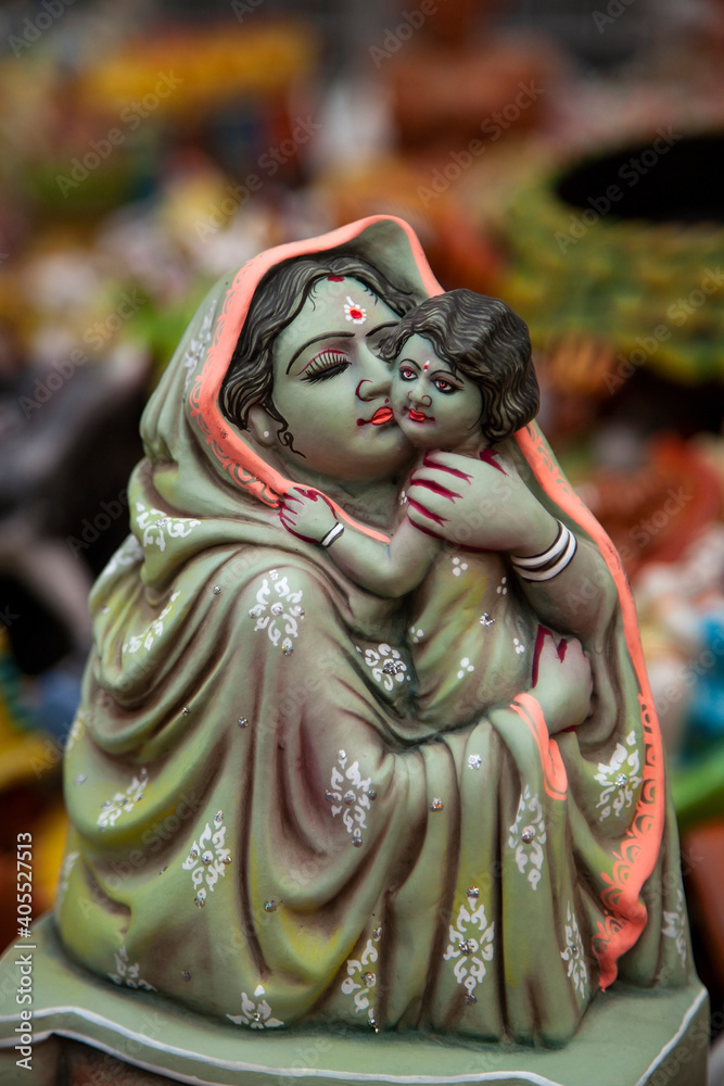 A small idol of a mother and child