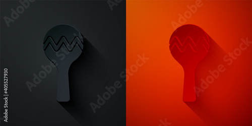 Paper cut Maracas icon isolated on black and red background. Music maracas instrument mexico. Paper art style. Vector.