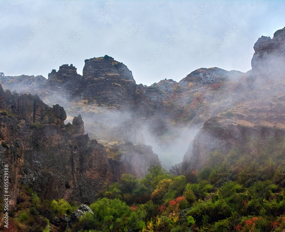 Misty colorful mountains and rocks