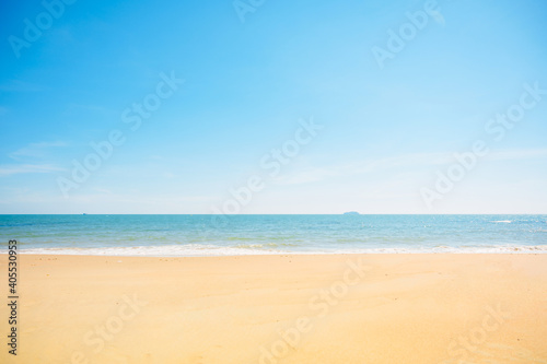 Landscape with white beach, the sea and the beautiful clouds in the blue sky © grooveriderz