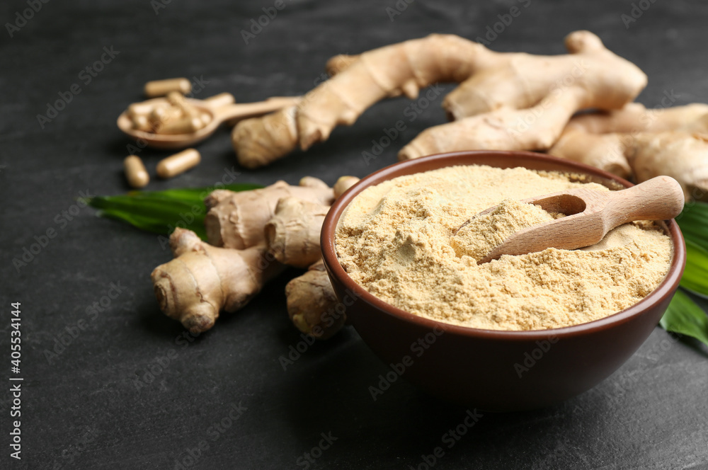 Dry and fresh ginger on black slate table, closeup Dry and fresh ginger on black slate table, closeup