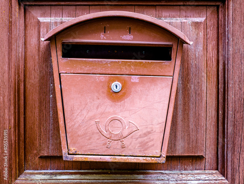 old letterbox at a door photo