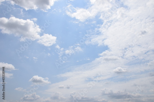 Background of light blue sky and beautifully patterned clouds