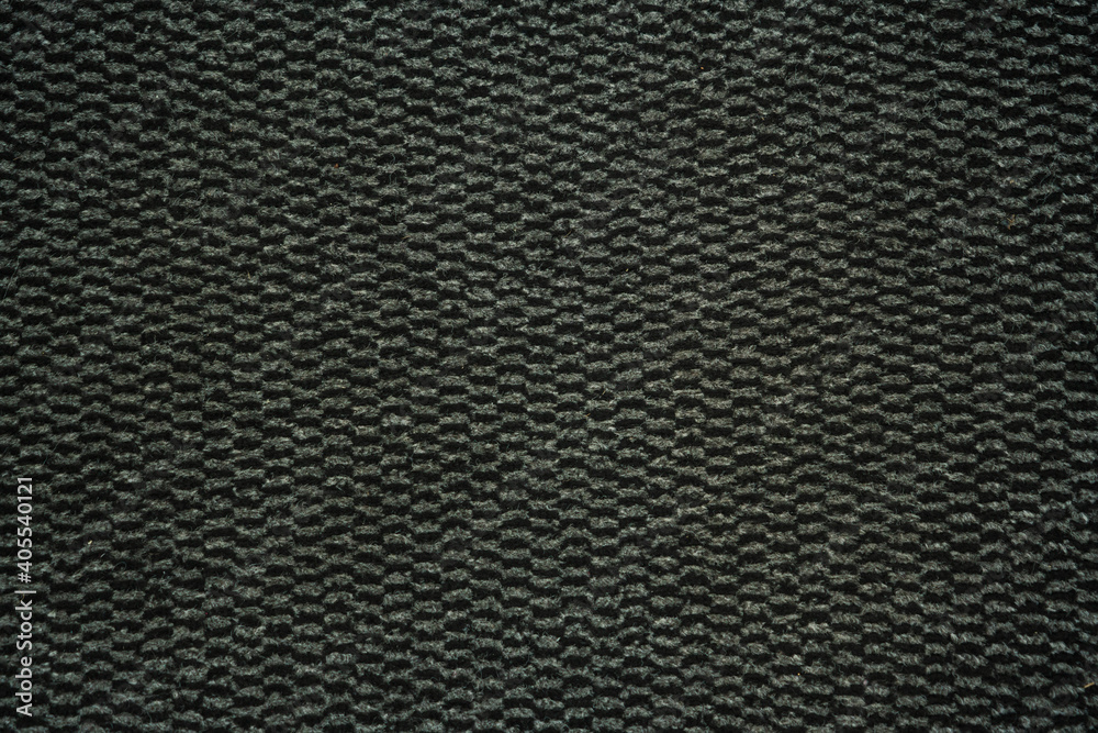 Black and grey carpet rug, texture / background, copy space or pattern. Black and grey carpet rug, texture / background, copy space or pattern.