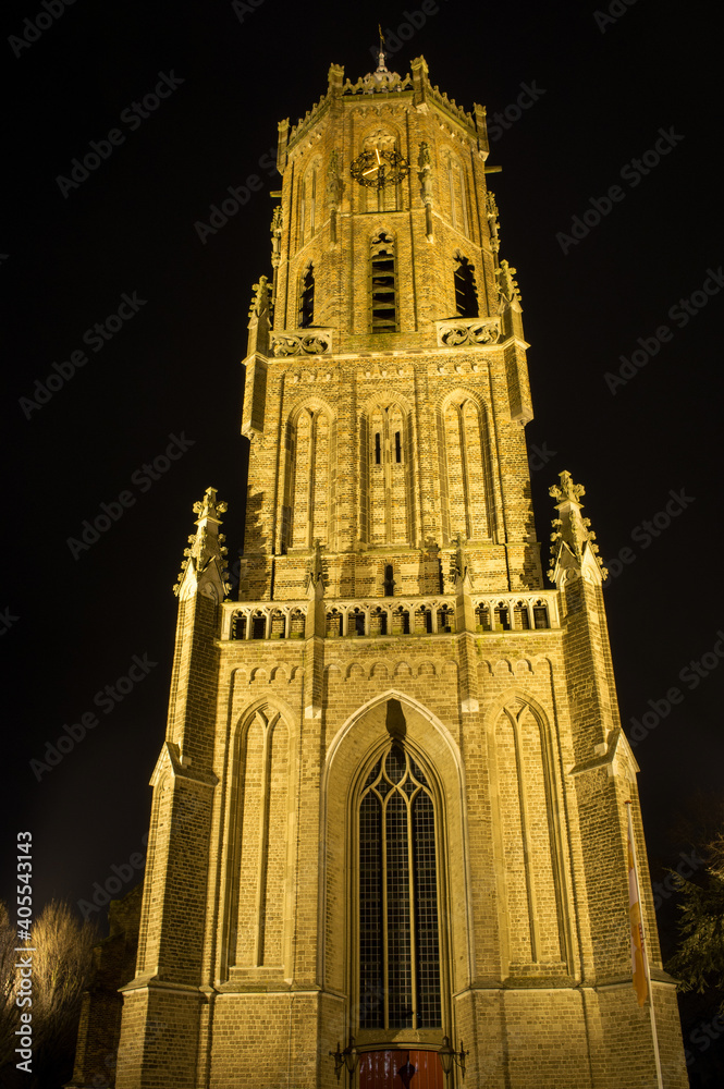 Tower of the Sint-Maartenskerk church at night in Elst, Netherlands