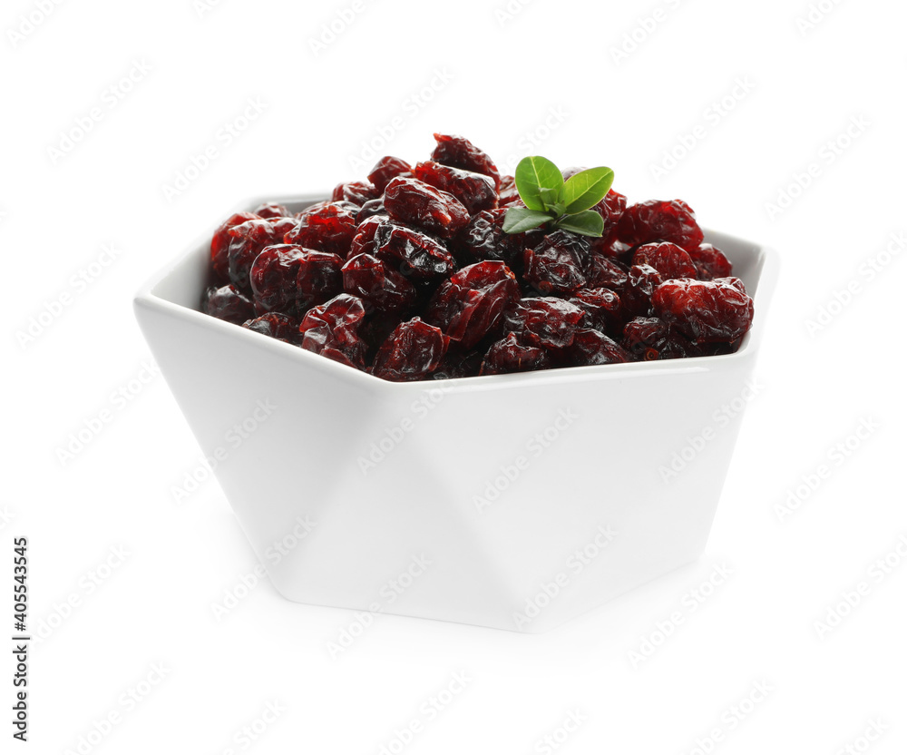 Tasty dried cranberries and leaves in bowl isolated on white Tasty dried cranberries and leaves in bowl isolated on white