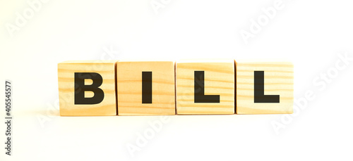 The word BILL. Wooden cubes with letters isolated on white background.