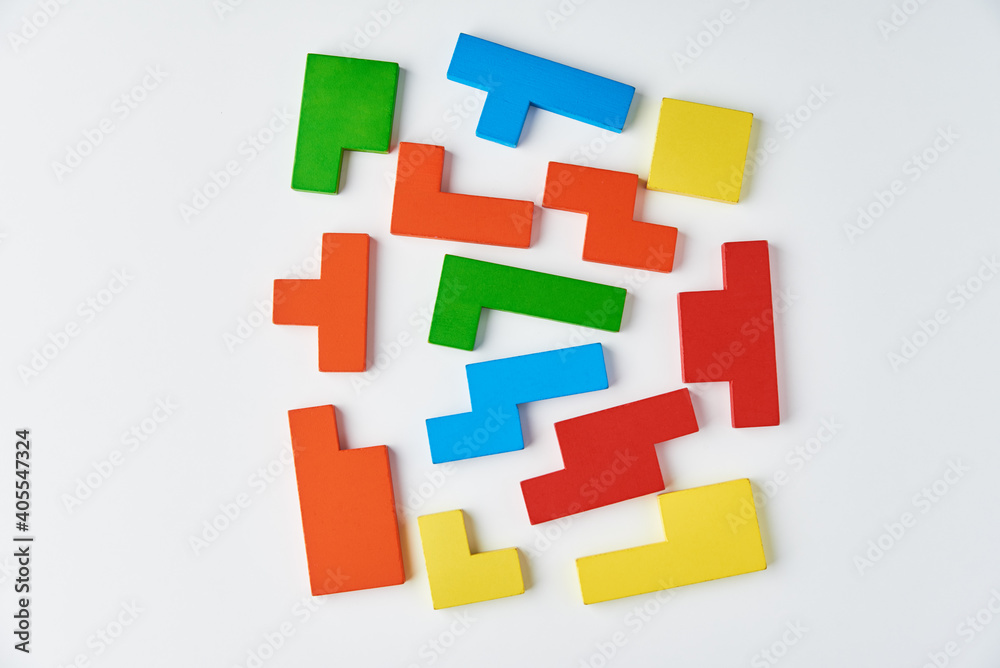 Different wooden blocks on white background. Concept of logical thinking and education Different wooden blocks on white background. Concept of logical thinking and education