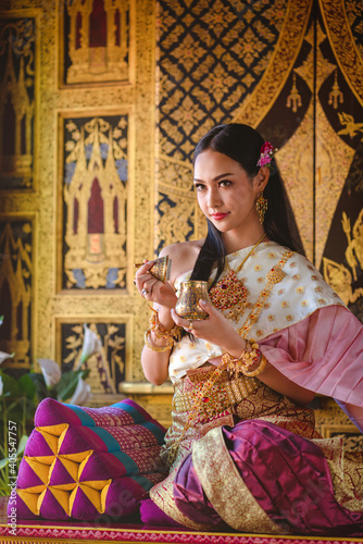 Luxury portrait of a beautiful Thai girl in traditional thai costume, identity culture of Thailand, identity culture of Asia