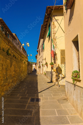 A quiet residential street in the historic medieval village of Batignano, Grosseto Province, Tuscany, Italy  © dragoncello