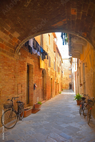 A residential alley in the historic medieval village of Buonconvento, Siena Province, Tuscany, Italy 