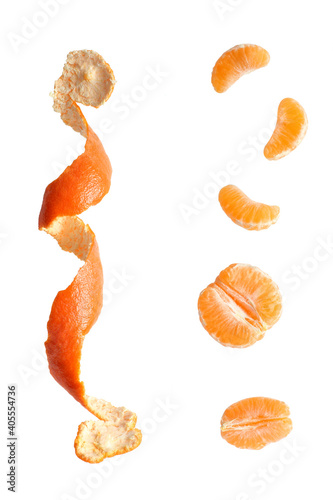 Bright tangerine on a clean background. Tangerine slices. Peeled tangerine. Citrus in flight. Mandarin peel