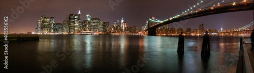 Night view of the emblematic buildings and skyscrapers of Manhattan  New York .  Skyline. Hudson River. Brooklyn Bridge 