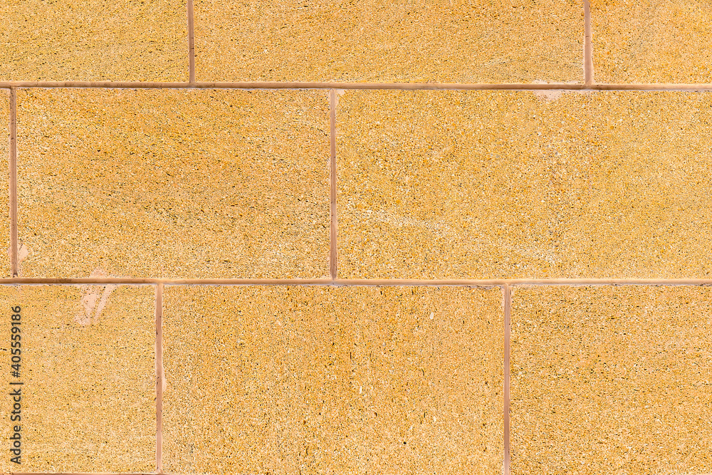 Close-up and flat lay of background of brown brick wall. Tiles for