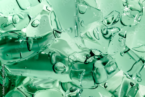 Liquid cream gel, green blue cosmetic texture with bubbles