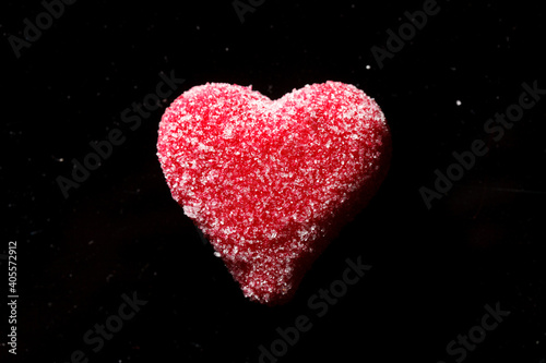 Marzipan heart on the black background